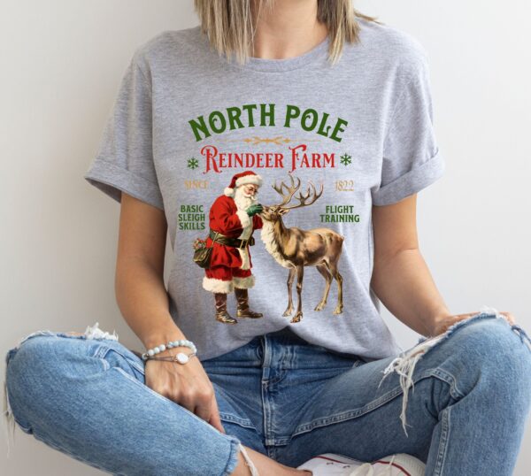 vintage christmas t shirt featuring retro santa and reindeer design for a fun holiday look at the north pole b5pxq scaled