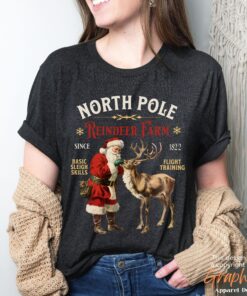 vintage christmas t shirt featuring retro santa and reindeer design for a fun holiday look at the north pole dhdsf scaled