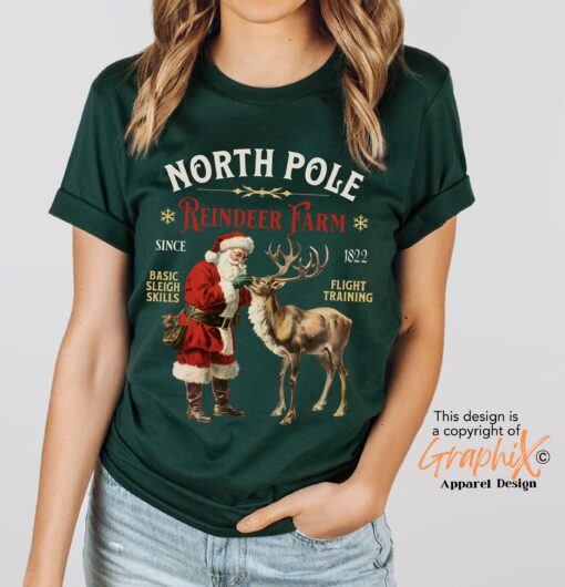 vintage christmas t shirt featuring retro santa and reindeer design for a fun holiday look at the north pole uj2bb scaled