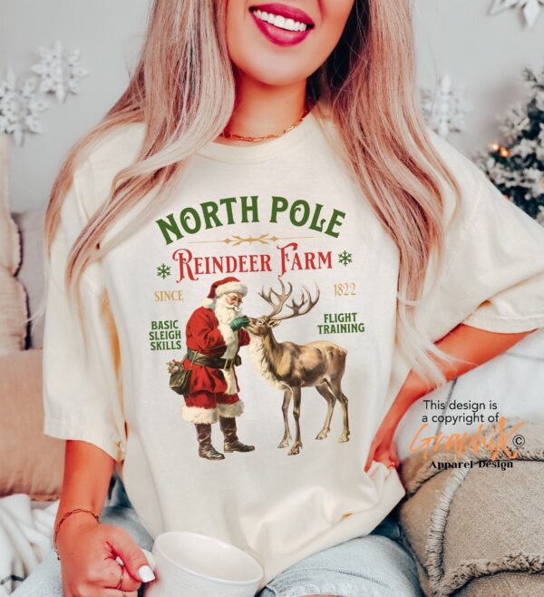 vintage christmas t shirt featuring retro santa and reindeer design for a fun holiday look at the north pole vdegd