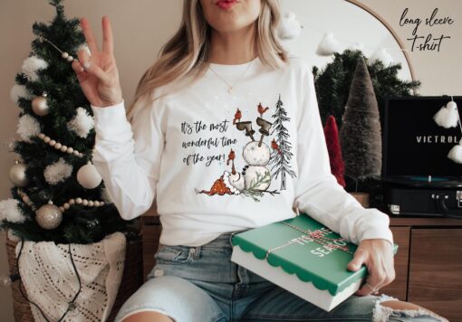 vintage christmas t shirt featuring snowman design for women celebrating its the most wonderful time of the year aoxlw scaled