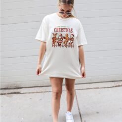 vintage christmas t shirt for book lovers featuring holiday reading design and festive literary theme eksbe scaled
