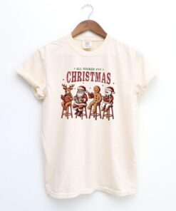 vintage christmas t shirt for book lovers featuring holiday reading design and festive literary theme j9hel scaled