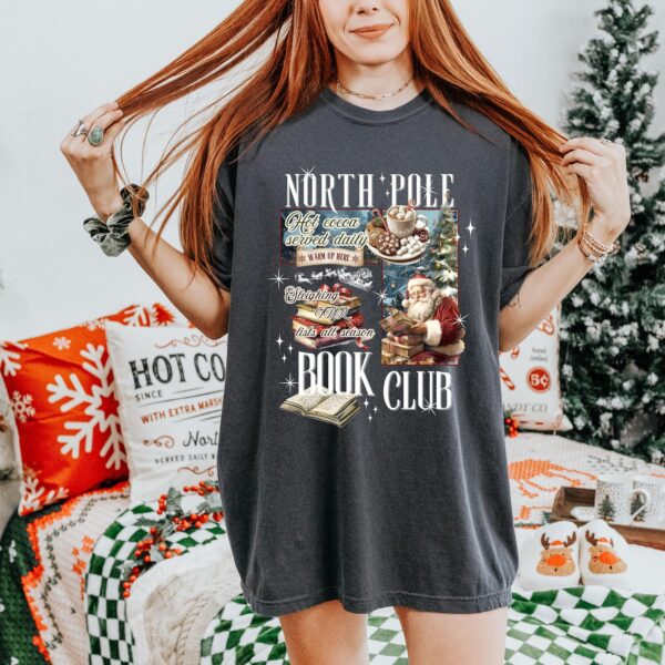 vintage christmas t shirt for book lovers featuring north pole book club design fun santa graphic for holiday celebrations dng9i scaled