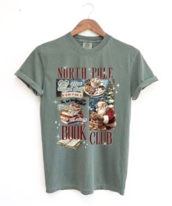 vintage christmas t shirt for book lovers featuring north pole book club design fun santa graphic for holiday celebrations g8ps8 scaled