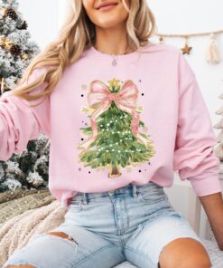 vintage christmas t shirt for women featuring a christmas tree bow design and comfortable fit for holiday celebrations oc9fe scaled