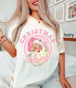 Vintage Christmas T Shirt for Women featuring Retro Pink Santa Claus Design in Comfort Colors for Family Holiday Celebrations