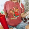vintage christmas t shirt for women with 1950s reindeer and girl design in oversized fit for retro holiday parties bsqmx