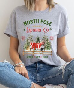 vintage christmas t shirt north pole laundry design with retro santa graphic for unique holiday style m9zkf scaled