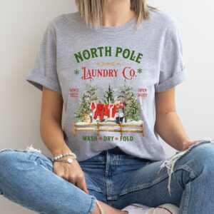 vintage christmas t shirt north pole laundry design with retro santa graphic for unique holiday style m9zkf scaled