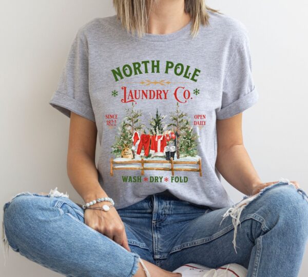 vintage christmas t shirt north pole laundry design with retro santa graphic for unique holiday style m9zkf scaled