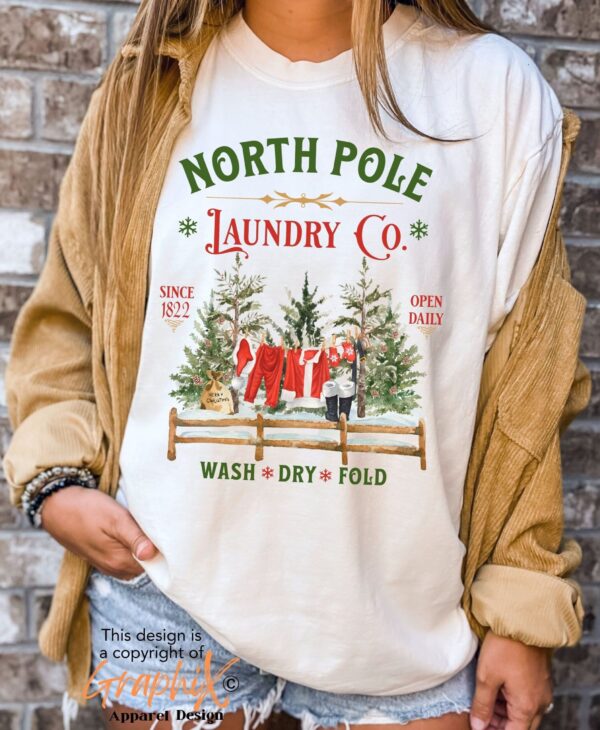 vintage christmas t shirt north pole laundry design with retro santa graphic for unique holiday style mk8a4 scaled