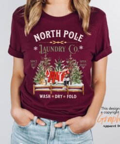 vintage christmas t shirt north pole laundry design with retro santa graphic for unique holiday style zqrrz scaled