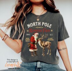 vintage christmas t shirt north pole reindeer design comfort colors retro style for festive holiday celebrations tk8jb