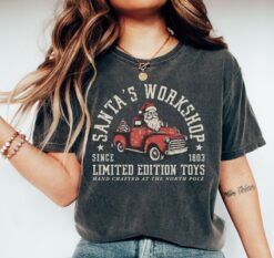 Vintage Christmas T Shirt Santas Workshop Retro Style Tee in Comfort Colors for Holiday Apparel and Festive Celebrations
