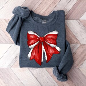 vintage christmas t shirt with bow design for women retro xmas tee in coquette style for festive celebrations lccox scaled