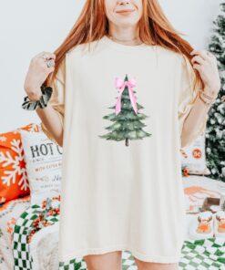 vintage christmas t shirt with pink bow design and christmas tree graphic for a fun holiday look d1chi scaled