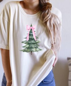 vintage christmas t shirt with pink bow design and christmas tree graphic for a fun holiday look lwdmo scaled