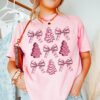 vintage christmas t shirt with pink coquette bow design and christmas tree cake print in comfort colors for trendy holiday style mwsp1 scaled