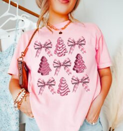 Vintage Christmas T Shirt with Pink Coquette Bow Design and Christmas Tree Cake Print in Comfort Colors for Trendy Holiday Style