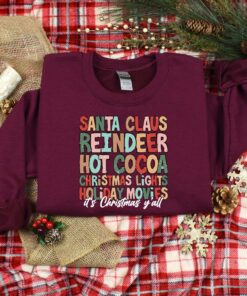 vintage christmas t shirt with santa claus design and reindeer graphic for holiday celebrations and family gatherings op7vw scaled