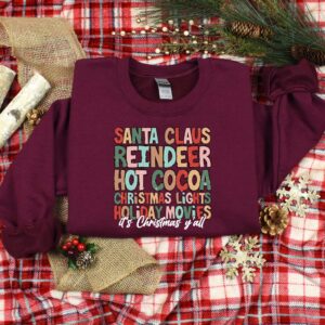 vintage christmas t shirt with santa claus design and reindeer graphic for holiday celebrations and family gatherings op7vw scaled