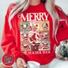 vintage christmas teacher sweatshirt with santa claus design for holiday celebrations and classroom festivities bdmzh