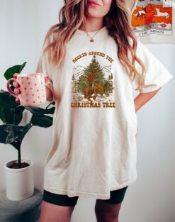 Vintage Cowboy Christmas T Shirt Rocking Around The Christmas Tree Design Comfortable Colors Tee for Holiday Celebrations