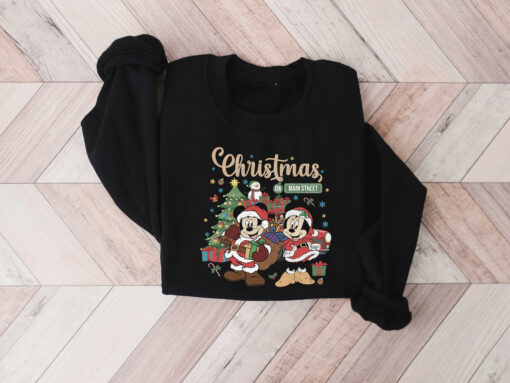 vintage disney christmas sweatshirt featuring retro mickey and minnie on main street sleigh rides for festive holiday style j5xoa scaled