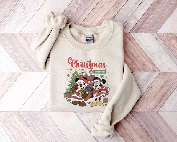 vintage disney christmas sweatshirt featuring retro mickey and minnie on main street sleigh rides for festive holiday style n1acv scaled