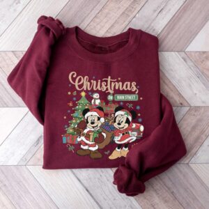 vintage disney christmas sweatshirt featuring retro mickey and minnie on main street sleigh rides for festive holiday style qahlt scaled