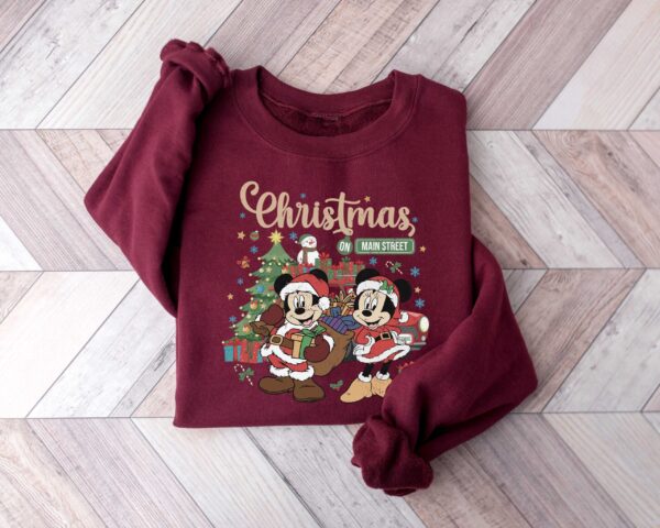 vintage disney christmas sweatshirt featuring retro mickey and minnie on main street sleigh rides for festive holiday style qahlt scaled