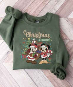 vintage disney christmas sweatshirt featuring retro mickey and minnie on main street sleigh rides for festive holiday style tmrue scaled