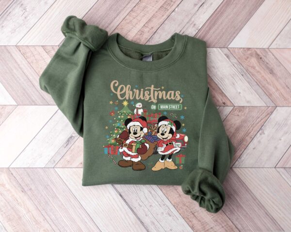 vintage disney christmas sweatshirt featuring retro mickey and minnie on main street sleigh rides for festive holiday style tmrue scaled