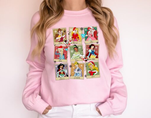 vintage disney princess christmas sweatshirt for family vacations featuring classic characters in a fun holiday design