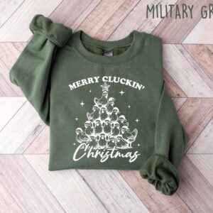 vintage funny christmas sweatshirt merry cluckin chicken shirt for farm animal lovers and holiday celebrations pt9pi