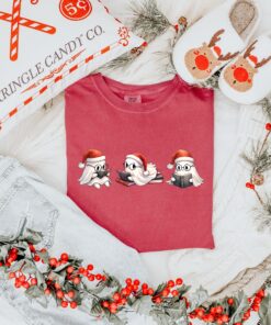 vintage funny christmas t shirt featuring ghosts reading books for holiday lovers spooky winter apparel nlhpw scaled