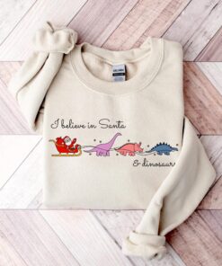 vintage funny christmas t shirt i believe in santa and dinosaurs dino reindeers design for dinosaur lovers 3yaaf scaled