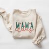 vintage mama claus sweatshirt for moms funny christmas crewneck with unique design for holiday celebrations and family gatherings t9r0p