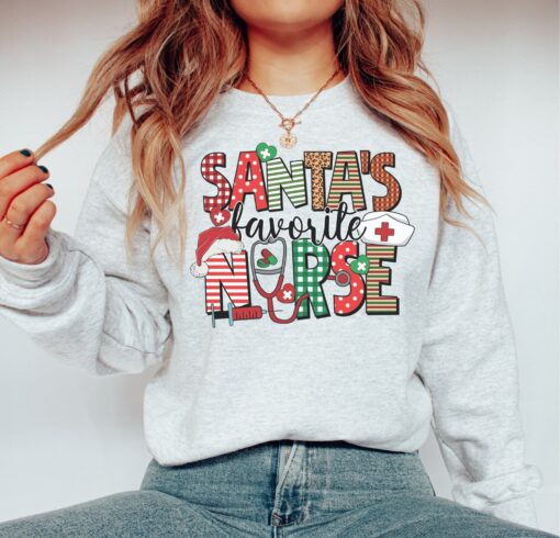 vintage nurse christmas sweatshirt for rns funny holiday shirt with unique design for nurses mmw54