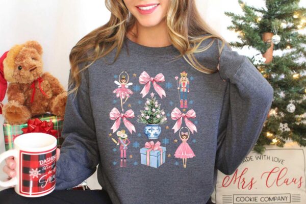 vintage nutcracker sweatshirt for christmas featuring coquette bow design and ballet doll aesthetic in soft comfortable fabric dzmlq