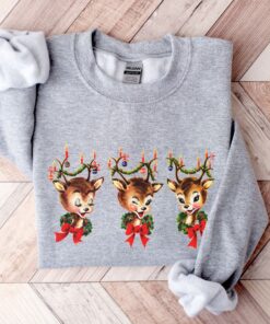 vintage rudolph christmas sweatshirt with reindeer design for holiday parties and festive celebrations xbxki