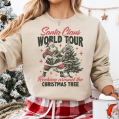 Vintage Santa Claus Sweatshirt for Christmas Featuring Retro Design and Rocking Around the Christmas Tree Theme