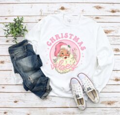 Vintage Santa Sweatshirt for Women in Pink  Retro Christmas Shirt with Classic Design and Trendy Style