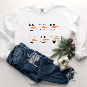 vintage snowman sweatshirt for women featuring fun snowman faces ideal for christmas and winter celebrations etas6