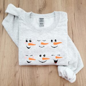 vintage snowman sweatshirt for women featuring fun snowman faces ideal for christmas and winter celebrations z50nr