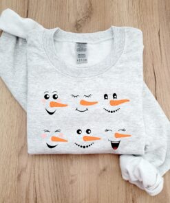 vintage snowman sweatshirt for women featuring fun snowman faces ideal for christmas and winter celebrations z50nr scaled