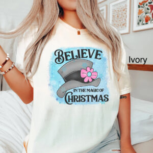 vintage t shirt believe in the magic of christmas frosty hat snowman design oversized tee for holiday celebrations and festive wear cqlnz