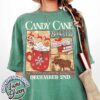 vintage t shirt candy cane design for book lovers featuring santa and christmas themes ideal for winter book club gatherings ufev7