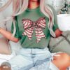 vintage t shirt christmas cake bow comfort colors tee aesthetic graphic design for women coquette style christmas apparel lb2tg